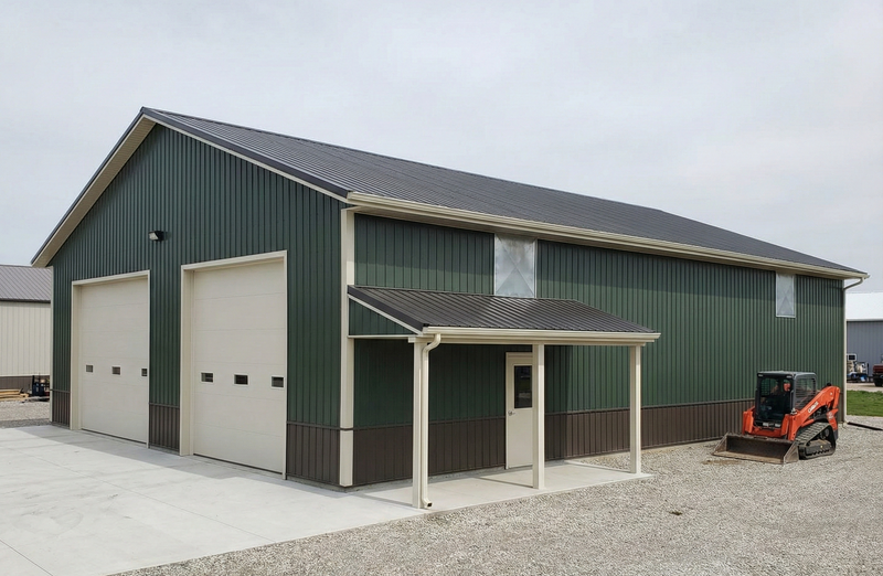 WVPFCO Indiana pole barn building with attached carport and compact utility vehicle parking in a rural setting
